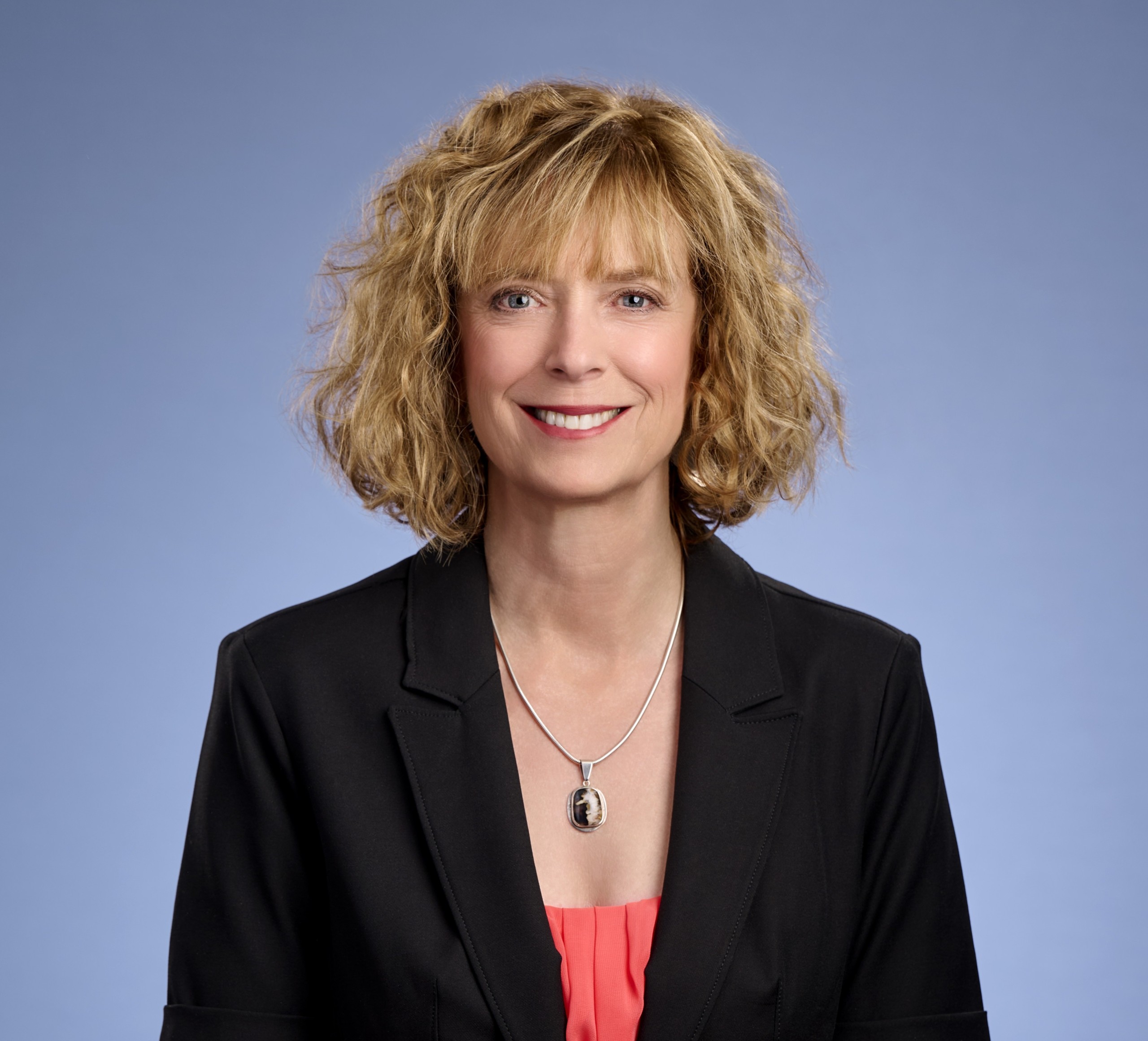 Portrait of intuitive wellness coach and speaker Lori Schwind